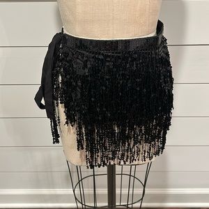 Black sequin wrap skirt.